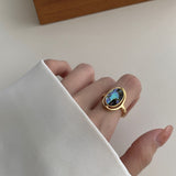 Two Shades Oval Turn Adjustable Ring